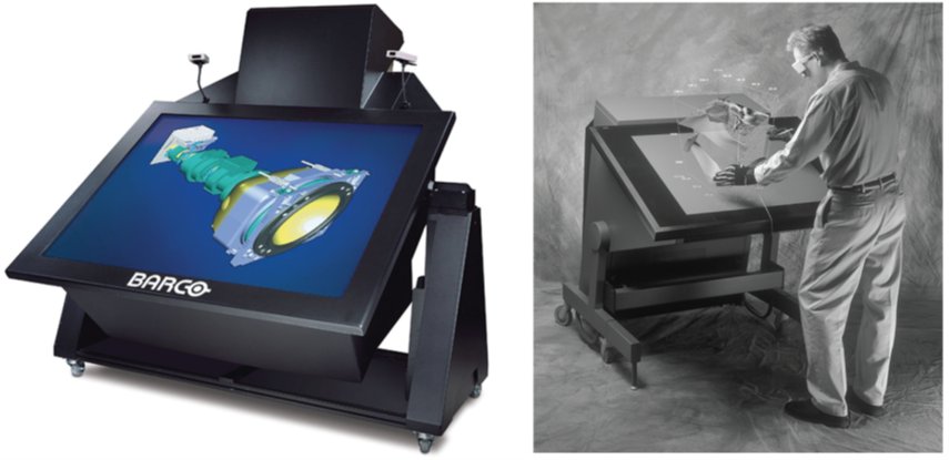 A tilting Barco workbench display and a person using an older rear-projected workbench display.